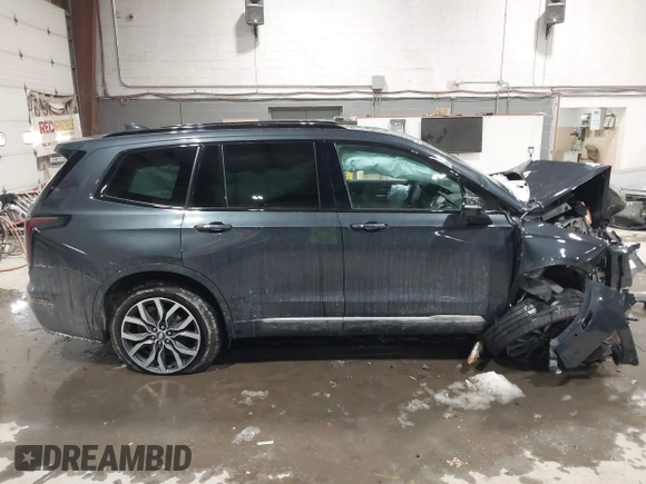 2022 Cadillac XT6 Sport with VIN 1GYKPGRS2NZ164879, listed as a IAAI auction lot 41555242 with 10,862 mi miles. Bid and sale history available at carsss.com. Image 13.