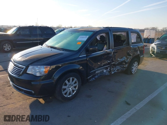 2014 Chrysler Town & Country Touring with VIN 2C4RC1BGXER124367, listed as a IAAI auction lot 41888366 with 143,638 mi miles and . Bid and sale history available at DreamBid. Image 2.