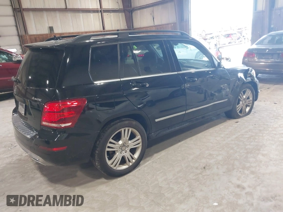 2015 Mercedes-Benz GLK with VIN WDCGG8JB0FG364079, listed as a IAAI auction lot 42096003 with 113,571 mi miles. Bid and sale history available at carsss.com. Image 4.