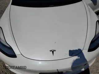 2020 Tesla Model 3 Long Range z VIN 5YJ3E1EB3LF787160, wystawiony jako Copart lot #58626965 z przebiegiem Nie podano mil oraz Szkoda całkowita • Salvage title. Historia ofert i sprzedaży dostępna na DreamBid. Obrazek 11.