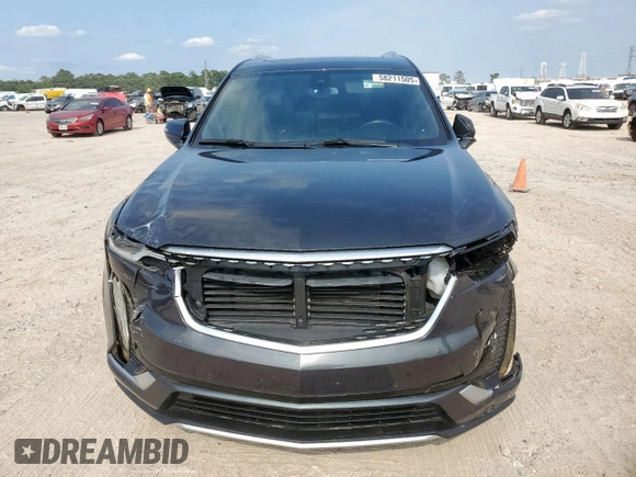 2022 Cadillac XT6 Premium Luxury z VIN 1GYKPCRS1NZ104567, wystawiony jako Copart lot #58211505 z przebiegiem 54 541 mil mil oraz Tytuł czysty. Historia ofert i sprzedaży dostępna na DreamBid. Obrazek 5.