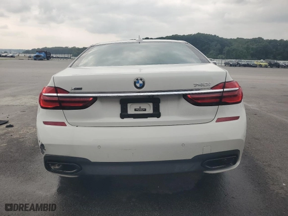 2019 BMW 7 Series 740i xDrive with VIN WBA7E4C52KGV28502, listed as a Copart auction lot 67488894 with 56,148 mi miles and Clean Title. Bid and sale history available at carsss.com. Image 6.