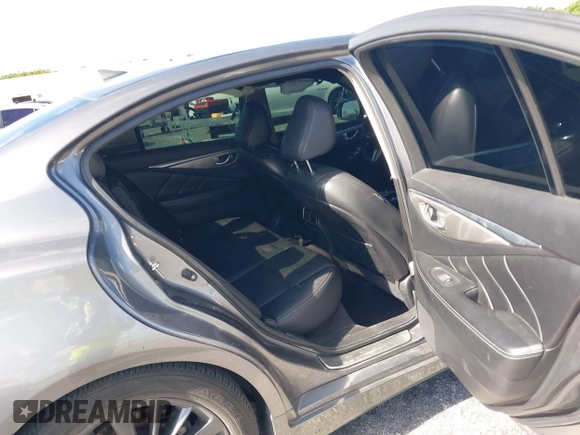 2014 Infiniti Q50 Premium with VIN JN1BV7AP7EM684448, listed as a IAAI auction lot 42564087 with 79,207 mi miles and . Bid and sale history available at DreamBid. Image 8.