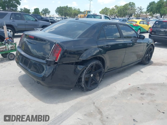 2013 Chrysler 300 with VIN 2C3CCAAG7DH685108, listed as a IAAI auction lot 42375248 with Not provided miles and . Bid and sale history available at DreamBid. Image 4.