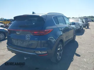 2021 Kia Sportage EX with VIN KNDPN3AC1M7889706, listed as a IAAI auction lot 41948559 with 52,329 mi miles and . Bid and sale history available at DreamBid. Image 4.