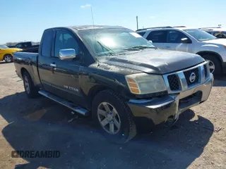 2005 Nissan Titan XE with VIN 1N6BA06A15N560400, listed as a IAAI auction lot 41656560 with 212,568 mi miles. Bid and sale history available at carsss.com. Image 1.