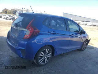 2015 Honda Fit EX-L with VIN 3HGGK5H8XFM776045, listed as a Copart auction lot 63940595 with 100,753 mi miles and Salvage title. Bid and sale history available at DreamBid. Image 3.
