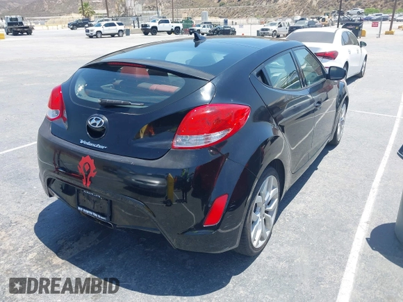 2013 Hyundai Veloster w/Gray Int with VIN KMHTC6AD2DU140750, listed as a IAAI auction lot 42615351 with 191,873 mi miles and . Bid and sale history available at DreamBid. Image 4.