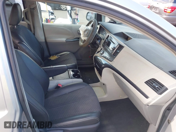 2011 Toyota Sienna SE with VIN 5TDXK3DC5BS062055, listed as a IAAI auction lot 42140951 with 141,539 mi miles and . Bid and sale history available at DreamBid. Image 5.