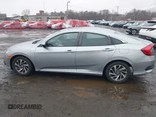 2016 Honda Civic EX with VIN 19XFC2F75GE217935, listed as a IAAI auction lot 41963307 with 87,477 mi miles and . Bid and sale history available at DreamBid. Image 14.