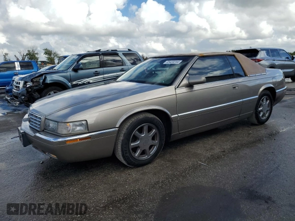 2000 Cadillac Eldorado z VIN 1G6EL12Y7YB703863, wystawiony jako Copart lot #85433244 z przebiegiem 175 416 mil mil oraz Szkoda całkowita • Salvage title. Historia ofert i sprzedaży dostępna na DreamBid. Obrazek 1.