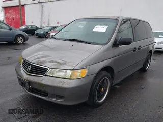 2000 Honda Odyssey LX z VIN 2HKRL1857YH570211, wystawiony jako IAAI lot #42139263 z przebiegiem 161 983 mil mil oraz . Historia ofert i sprzedaży dostępna na DreamBid. Obrazek 2.