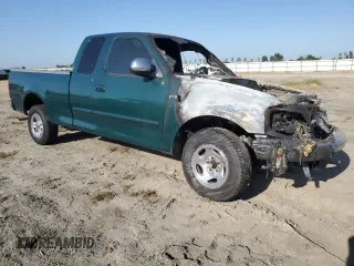 2000 Ford F-150 XL with VIN 1FTZX1720YKA53930, listed as a Copart auction lot 56052925 with Not provided miles and Salvage title. Bid and sale history available at DreamBid. Image 4.