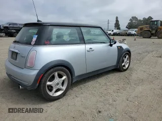 2005 MINI Hardtop with VIN WMWRC335X5TJ70165, listed as a Copart auction lot 53918445 with 145,572 mi miles and Salvage title. Bid and sale history available at DreamBid. Image 3.