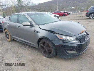 2013 Kia Optima SX with VIN 5XXGR4A6XDG140804, listed as a IAAI auction lot 42078793 with 237,404 mi miles. Bid and sale history available at carsss.com. Image 1.