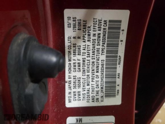 2010 Honda Insight LX with VIN JHMZE2H52AS034613, listed as a Copart auction lot 52701795 with 232,541 mi miles and Salvage Title. Bid and sale history available at DreamBid. Image 12.
