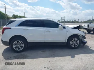2020 Cadillac XT5 Premium Luxury FWD with VIN 1GYKNCRS7LZ129119, listed as a IAAI auction lot 41710878 with 52,575 mi miles and . Bid and sale history available at carsss.com. Image 13.
