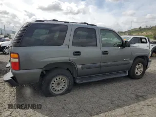 2002 Chevrolet Tahoe LS with VIN 1GNEC13T22R268336, listed as a Copart auction lot 50947675 with 238,425 mi miles and Salvage title. Bid and sale history available at DreamBid. Image 3.