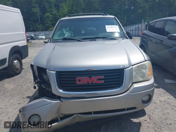 2004 GMC Envoy SLT with VIN 1GKDS13S742230325, listed as a IAAI auction lot 42385113 with 177,989 mi miles and . Bid and sale history available at DreamBid. Image 12.