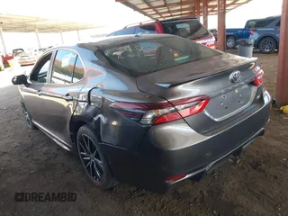 2022 Toyota Camry SE with VIN 4T1G11AK8NU685930, listed as a IAAI auction lot 41711373 with 66,634 mi miles and . Bid and sale history available at DreamBid. Image 3.