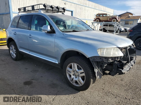 2004 Volkswagen Touareg with VIN WVGEM77LX4D071560, listed as a Copart auction lot 41630995 with 168,906 mi miles and Salvage title. Bid and sale history available at DreamBid. Image 4.