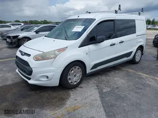2014 Ford Transit Connect XLT with VIN NM0LS7F79E1140809, listed as a IAAI auction lot 42006811 with 183,152 mi miles. Bid and sale history available at carsss.com. Image 2.