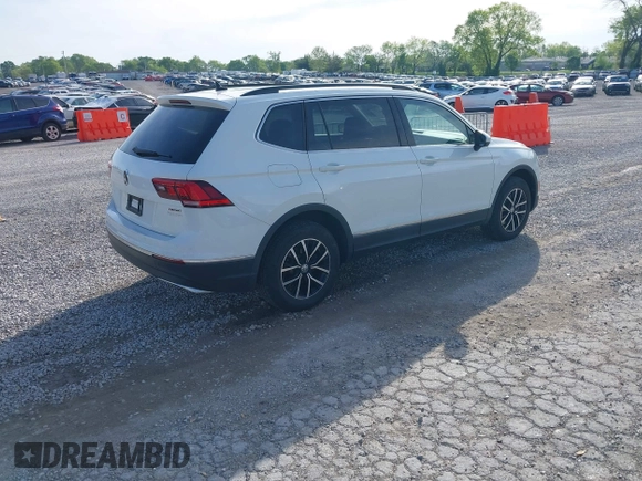 2021 Volkswagen Tiguan SE with VIN 3VV2B7AX6MM139903, listed as a IAAI auction lot 42060657 with 42,747 mi miles and . Bid and sale history available at DreamBid. Image 4.