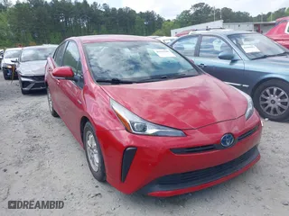 2021 Toyota Prius L Eco with VIN JTDKAMFU7M3147346, listed as a IAAI auction lot 41979206 with 55,267 mi miles. Bid and sale history available at carsss.com. Image 13.