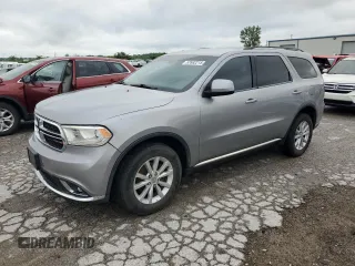 2014 Dodge Durango SXT z VIN 1C4RDJAG8EC596784, wystawiony jako Copart lot #57682215 z przebiegiem 142 008 mil mil oraz Szkoda całkowita • Salvage title. Historia ofert i sprzedaży dostępna na DreamBid. Obrazek 1.
