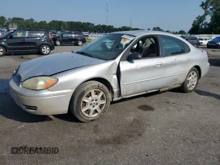 2006 Ford Taurus SE with VIN 1FAFP53UX6A124156, listed as a Copart auction lot 62056905 with 121,043 mi miles and Salvage title. Bid and sale history available at DreamBid. Image 1.