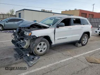 2017 Jeep Grand Cherokee Laredo with VIN 1C4RJEAG6HC614543, listed as a Copart auction lot 55804605 with 89,730 mi miles and Salvage title. Bid and sale history available at DreamBid. Image 1.