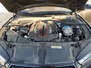 2018 Audi S7 Prestige z VIN WAU2FAFC2JN091644, wystawiony jako Copart lot #49676515 z przebiegiem 94 794 mil mil oraz Szkody całkowita. Historia ofert i sprzedaży dostępna na DreamBid. Obrazek 11.
