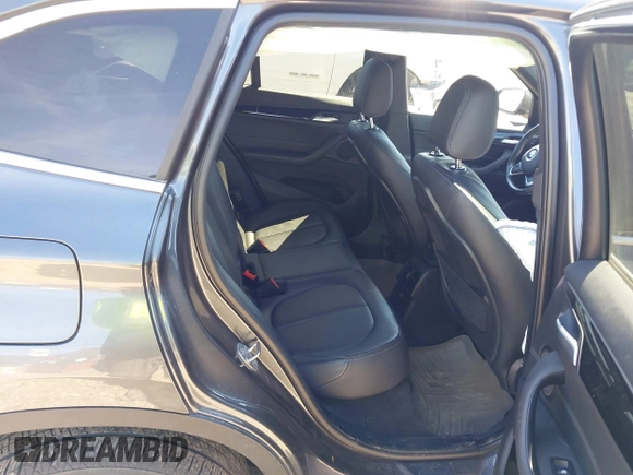 2017 BMW X1 sDrive28i with VIN WBXHU7C37H5H32815, listed as a IAAI auction lot 41837113 with 67,097 mi miles. Bid and sale history available at carsss.com. Image 8.