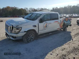 2019 Nissan Titan XD SL with VIN 1N6BA1F43KN511419, listed as a Copart auction lot 77875274 with 27,447 mi miles and Salvage Title. Bid and sale history available at carsss.com. Image 1.