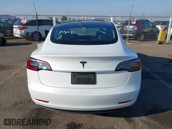 2023 Tesla Model 3 with VIN 5YJ3E1EA2PF582331, listed as a IAAI auction lot 41043858 with 33,601 mi miles and . Bid and sale history available at DreamBid. Image 16.