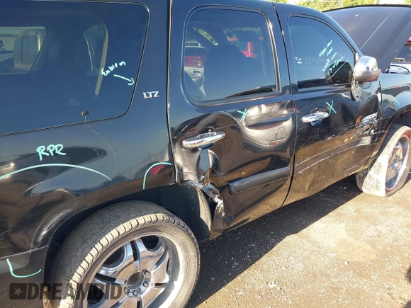 2008 Chevrolet Tahoe LTZ with VIN 1GNFK13018R259715, listed as a IAAI auction lot 42642469 with 208,452 mi miles and . Bid and sale history available at DreamBid. Image 6.