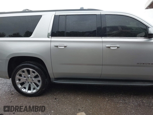 2015 Chevrolet Suburban LT with VIN 1GNSCJKC9FR617227, listed as a IAAI auction lot 42127511 with 167,924 mi miles and . Bid and sale history available at DreamBid. Image 13.