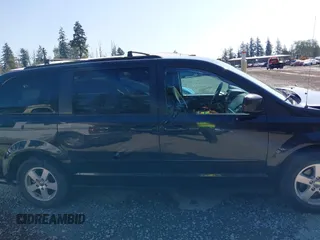 2012 Dodge Grand Caravan SXT with VIN 2C4RDGCG2CR319651, listed as a IAAI auction lot 42097594 with 155,521 mi miles and . Bid and sale history available at DreamBid. Image 13.