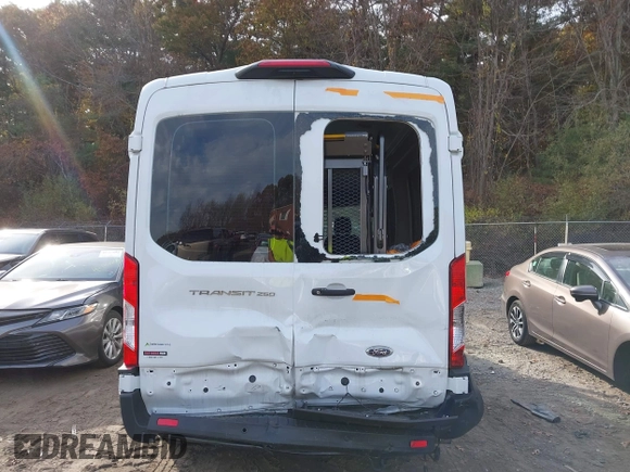 2023 Ford Transit Cargo with VIN 1FTBR1C86PKA52494, listed as a IAAI auction lot 40740671 with 9,999 mi miles and . Bid and sale history available at DreamBid. Image 6.