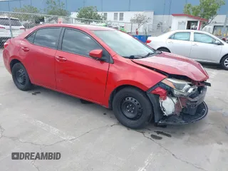 2015 Toyota Corolla L z VIN 5YFBURHE7FP256622, wystawiony jako IAAI lot #41899900 z przebiegiem 128 740 mil mil oraz . Historia ofert i sprzedaży dostępna na DreamBid. Obrazek 1.
