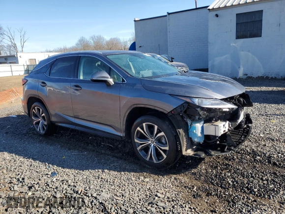 2021 Lexus RX with VIN 2T2HZMDA5MC293551, listed as a Copart auction lot 47297435 with 114,007 mi miles and Salvage Title. Bid and sale history available at carsss.com. Image 4.