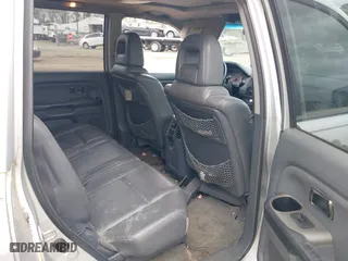 2005 Honda Pilot EX-L with RES with VIN 5FNYF18695B018134, listed as a IAAI auction lot 41962595 with 264,599 mi miles. Bid and sale history available at carsss.com. Image 8.