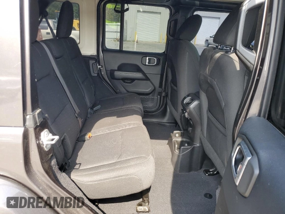 2018 Jeep Wrangler Unlimited Sahara z VIN 1C4HJXENXJW325069, wystawiony jako Copart lot #57405885 z przebiegiem 74 052 mil mil oraz Czysty tytuł • Clean title. Historia ofert i sprzedaży dostępna na DreamBid. Obrazek 10.