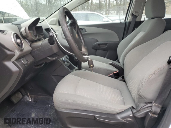 2016 Chevrolet Sonic LS with VIN 1G1JA6SH6G4169247, listed as a Copart auction lot 49928575 with 101,200 mi miles and Salvage Title. Bid and sale history available at DreamBid. Image 7.