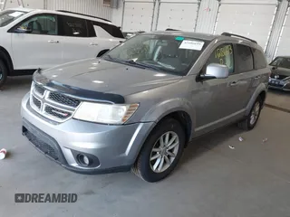 2015 Dodge Journey SXT z VIN 3C4PDCBG1FT587061, wystawiony jako IAAI lot #42186693 z przebiegiem 186 551 mil mil oraz . Historia ofert i sprzedaży dostępna na DreamBid. Obrazek 2.