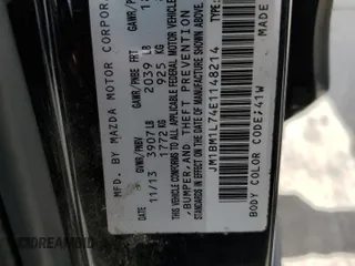 2014 Mazda 3 i Touring with VIN JM1BM1L74E1148214, listed as a Copart auction lot 54272605 with 158,278 mi miles and Salvage title. Bid and sale history available at DreamBid. Image 12.