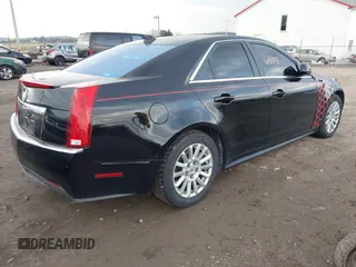 2011 Cadillac CTS z VIN 1G6DC5EY1B0156347, wystawiony jako IAAI lot #41496903 z przebiegiem 128 304 mil mil oraz . Historia ofert i sprzedaży dostępna na DreamBid. Obrazek 4.