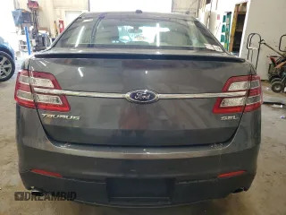 2015 Ford Taurus SEL with VIN 1FAHP2E84FG102318, listed as a Copart auction lot 61744685 with 82,149 mi miles and Salvage title. Bid and sale history available at DreamBid. Image 6.