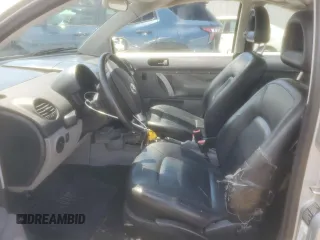 2002 Volkswagen Beetle GLS with VIN 3VWCB21C32M410168, listed as a Copart auction lot 55098545 with 166,410 mi miles and Salvage title. Bid and sale history available at DreamBid. Image 7.
