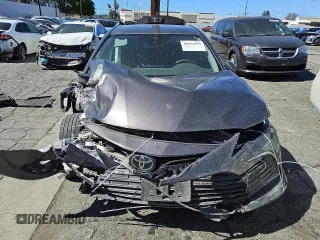 2023 Toyota Camry LE z VIN 4T1R11AKXPU764124, wystawiony jako Copart lot #47268875 z przebiegiem 37 406 mil mil oraz Szkoda całkowita • Salvage title. Historia ofert i sprzedaży dostępna na DreamBid. Obrazek 5.